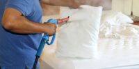 Optima Steamer being used to steam a pillow