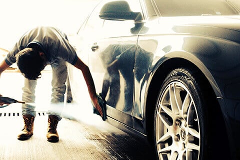 Premium Photo  Process of steam cleaning inside handle of car